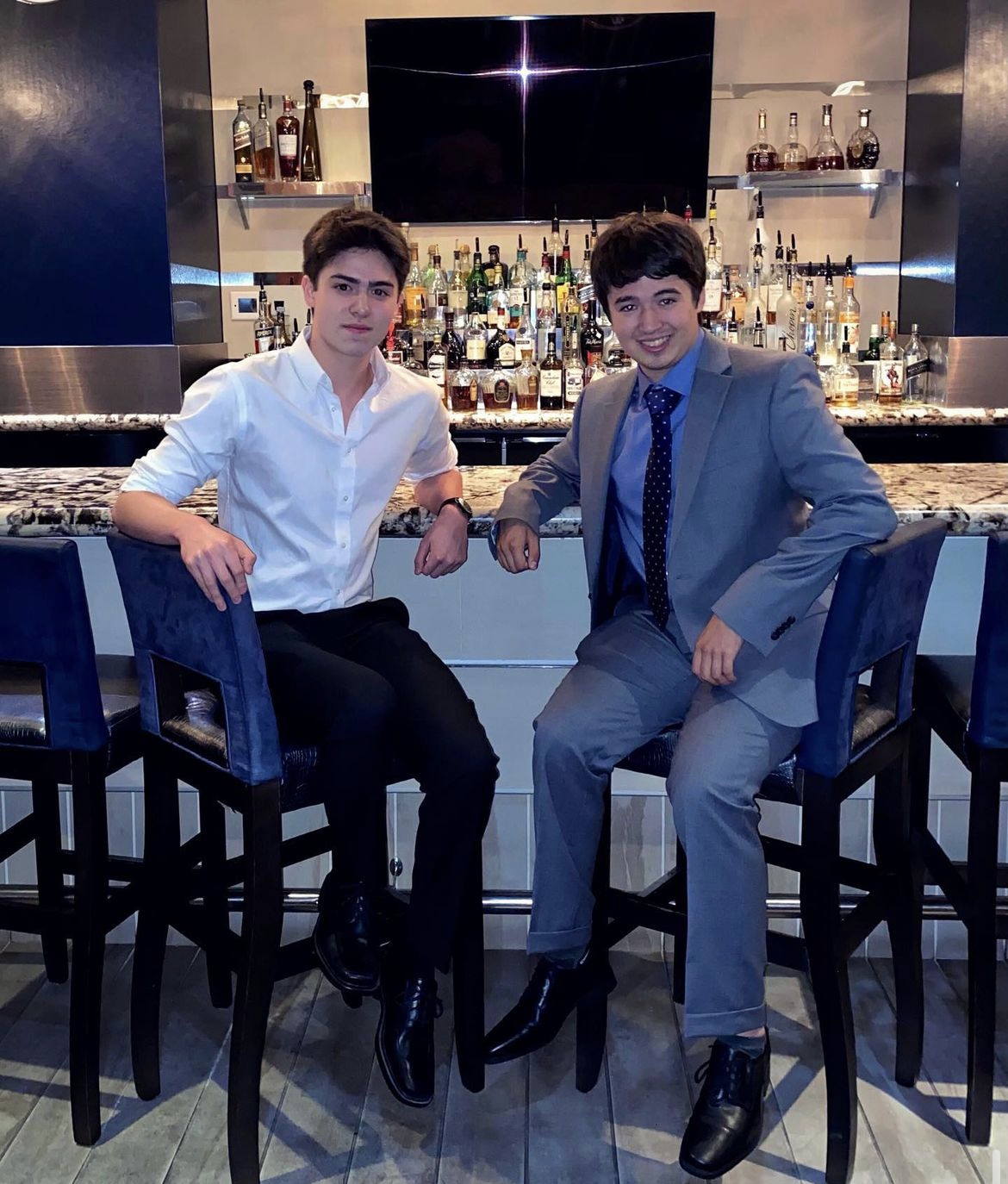 Steve Draughn posing at dinner with his brother, Carleton