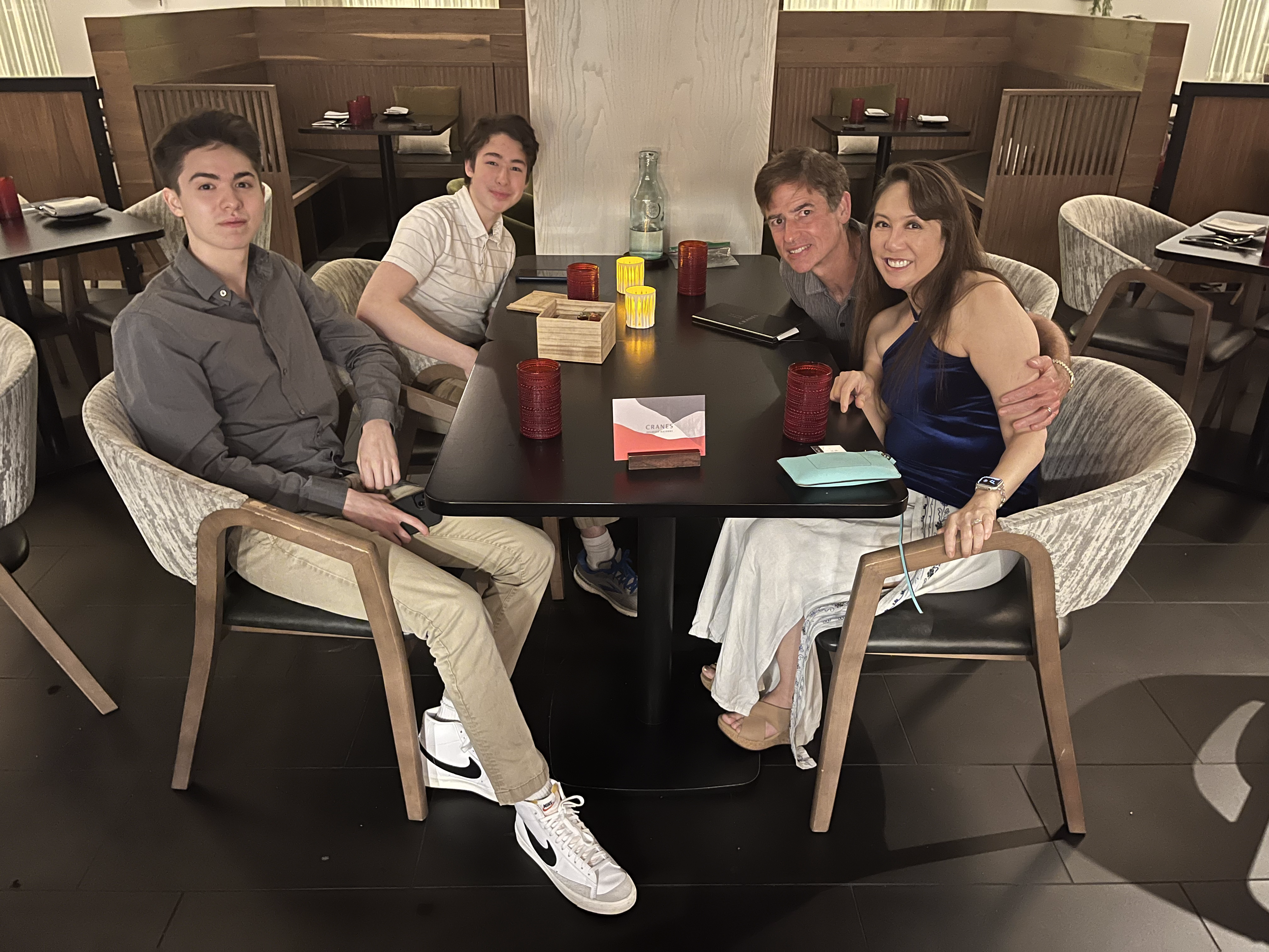 Steve Draughn with his family, including his mother, Angie Kim, father, Jim, and younger brother, Andrew